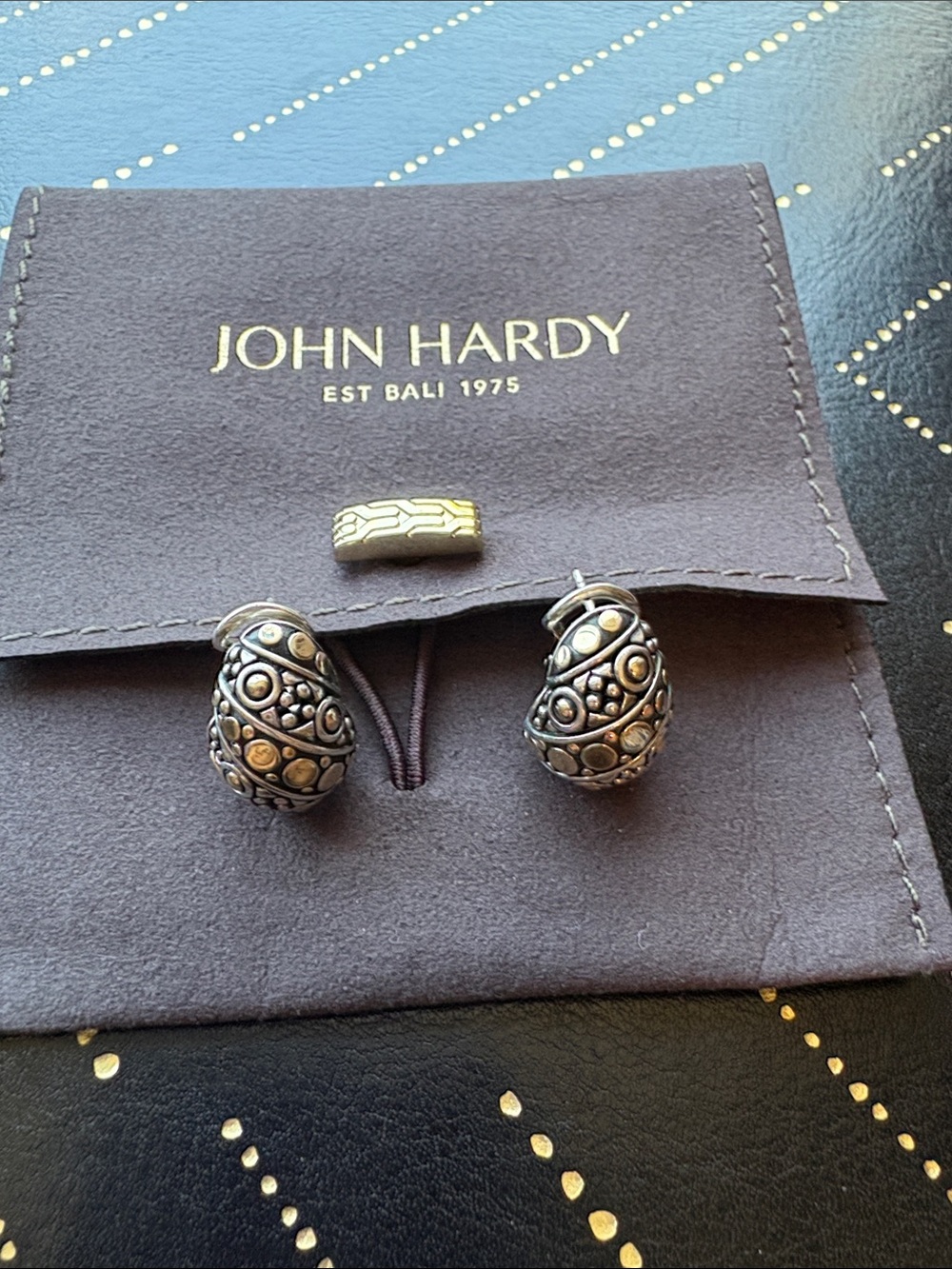 John Hardy omega back 18kt/925 earrings.